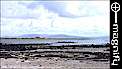 View of the Mutton Island lighthouse and mysterious stone circles visible only at low tide, click to MAGNIFY!